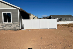 Custom-vinyl-fence-with-gate-access-installation-in-Hurricane-Ut-scaled