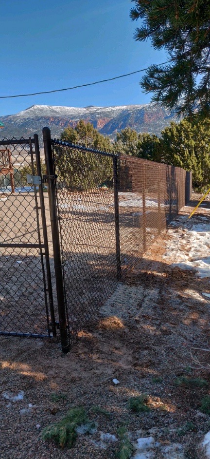 Brown colored chain link fence install in cedar city utah