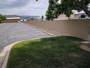 Chain link privacy link fence install at the Laverkin, Ut LDS Church