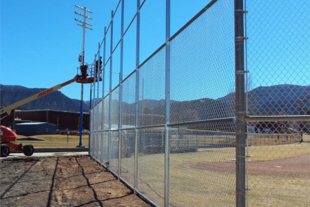 Baseball field chain link fence install